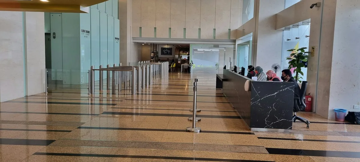 Commercial lobby with spotless floors and gleaming glass doors